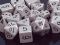 Dice - Opaque: Poly Set Dark Grey with black (Set of 7) by Chessex Manufacturing